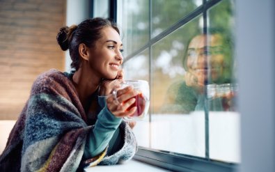 A woman looking out of a window